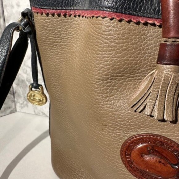 Dooney & Bourke Vintage Drawstring All Weather Leather Bucket Bag Tan Navy - Picture 3 of 14
